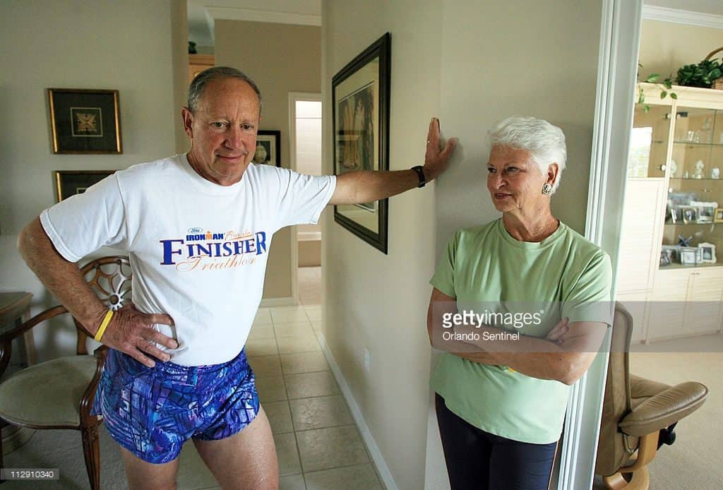 Tony Handler, left, poses for portrait with his wife Narda, at their Poinciana, Florida home, May 6, 2008. Twenty-five years ago, doctors discovered he had pancreatic cancer and despite all of his health problems, he keeps competing in triathlons. (Ricardo Ramirez Buxeda/Orlando Sentinel/MCT)